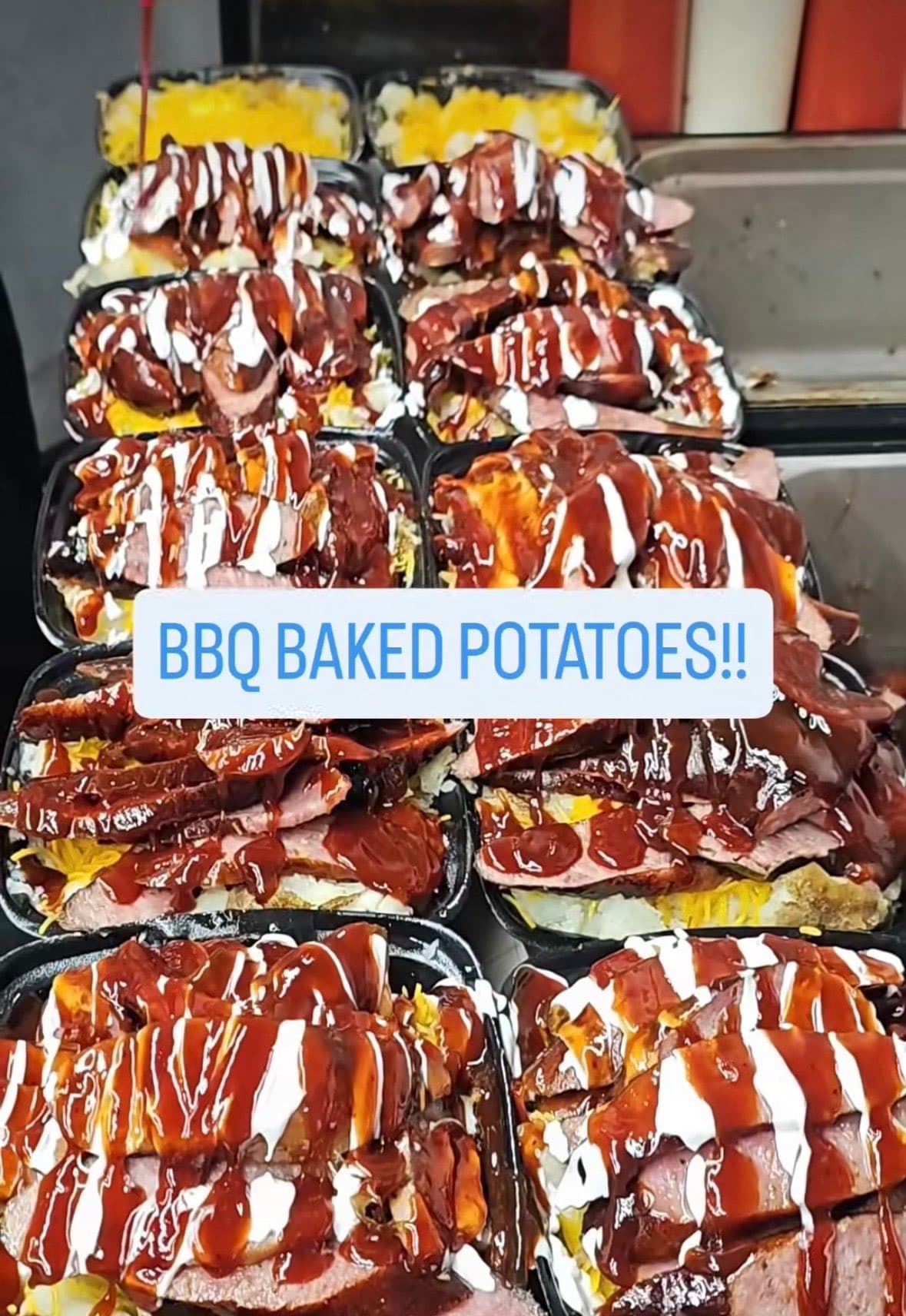 BBQ baked potatoes stacked for catering events — Lil Moe's Potato Trap Houston BBQ food truck